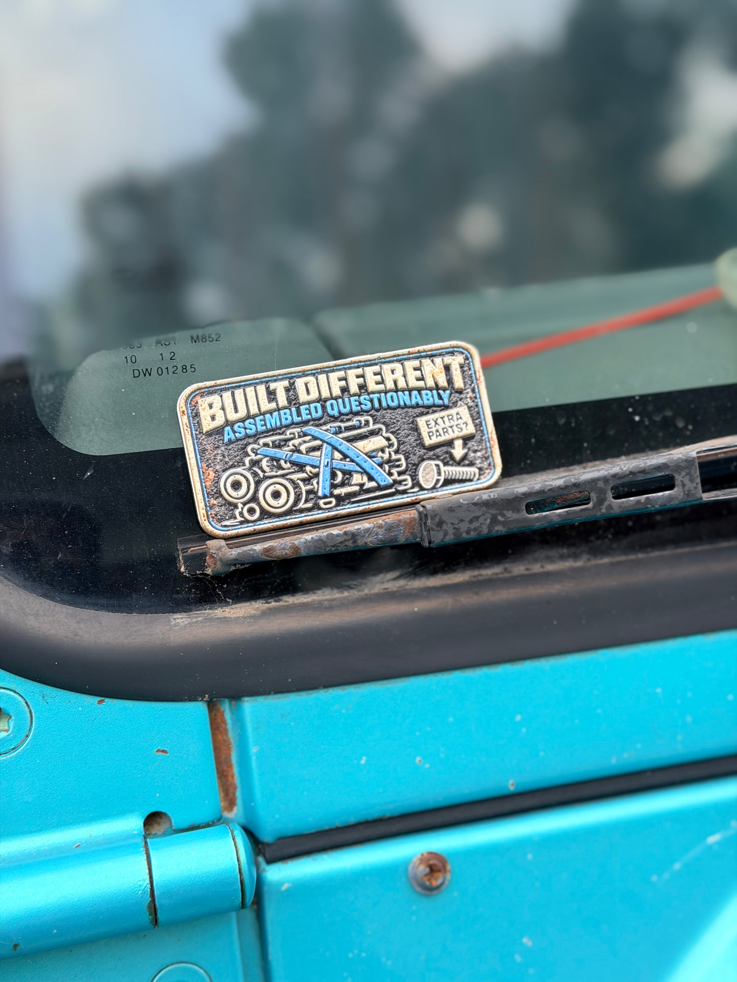 Built Different trail badge detail 3